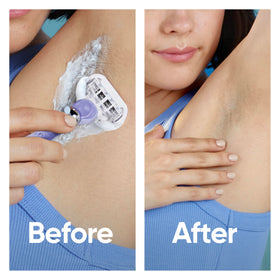 Gillette Venus Deluxe Smooth Swirl razor blade refills next to a Venus handle
