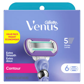 Gillette Venus Deluxe Smooth Swirl razor blade refills with a floral background