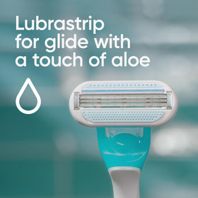 Gillette Venus Tropical Disposable Razor in hand demonstrating ergonomic design