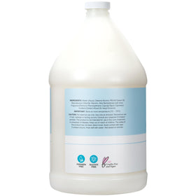 Ginger Lily Farms 1 gallon Moisturizing Conditioner pouring into dispenser