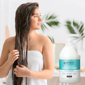 Ginger Lily Farms conditioner bottle with ocean breeze theme