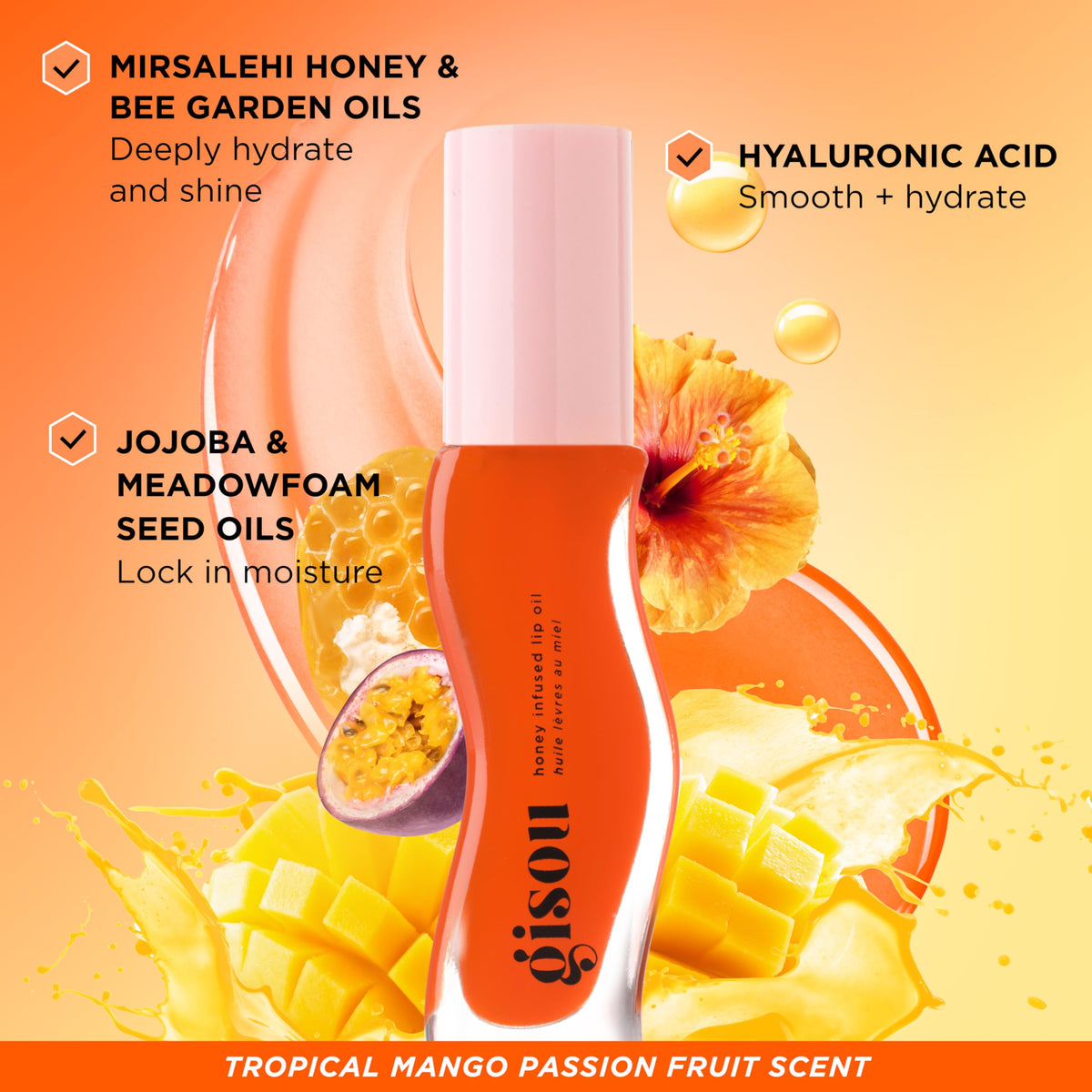 Gisou Honey Infused Lip Oil Mango Passion Punch texture on hand
