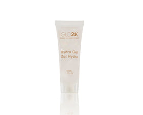 GLO24K Super Wand in use on a woman's face
