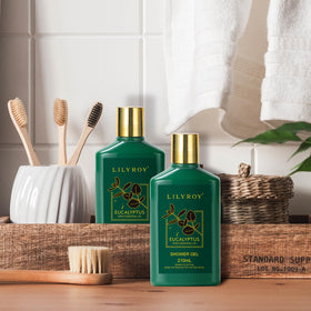 Golden bath bomb and eucalyptus leaves in LILY ROY Spa set
