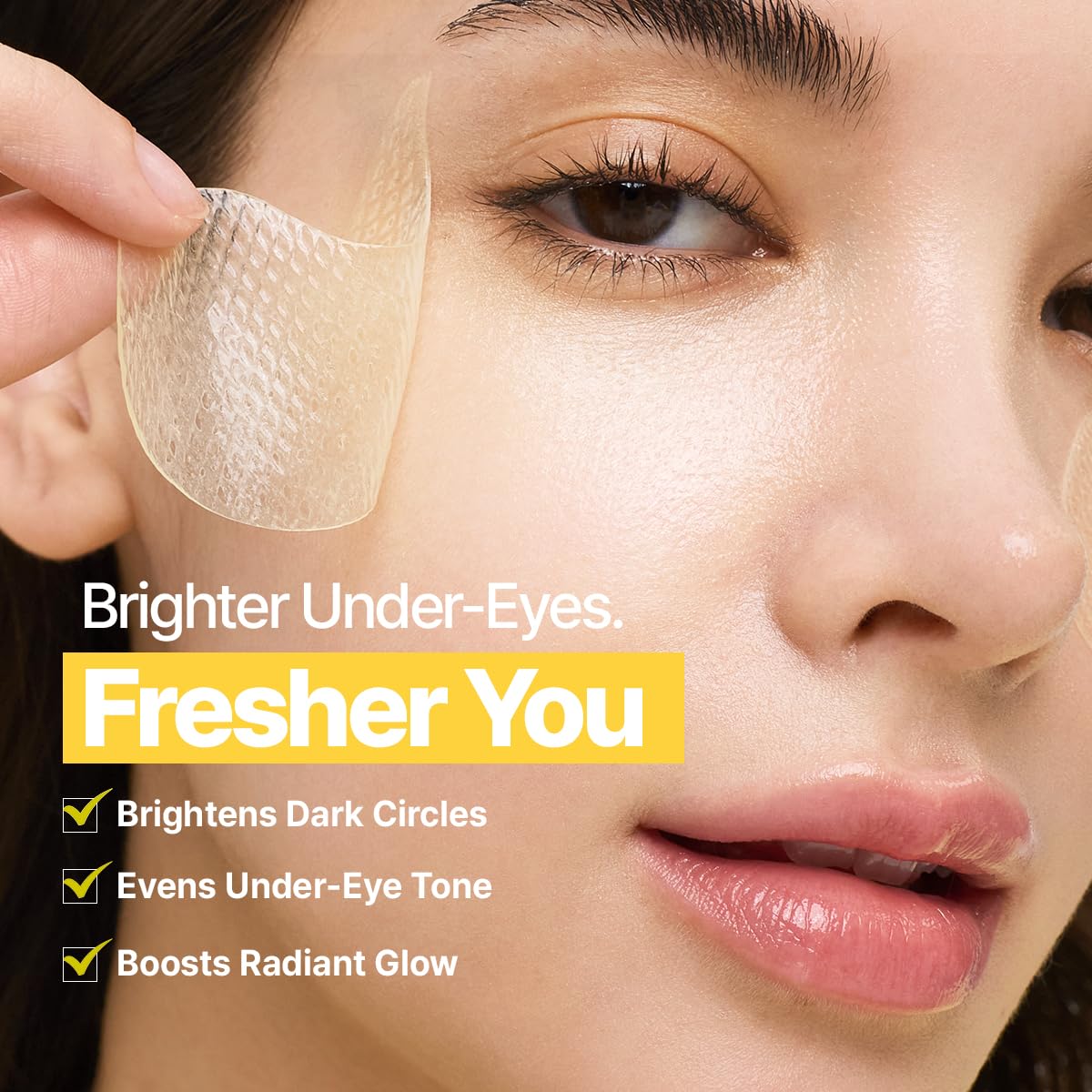 GOODAL Green Tangerine Vitamin C Eye Patches being applied under eye