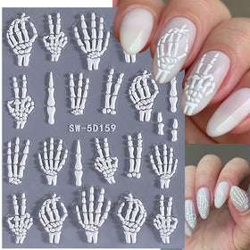 Gothic nail art stickers displayed on a smooth surface
