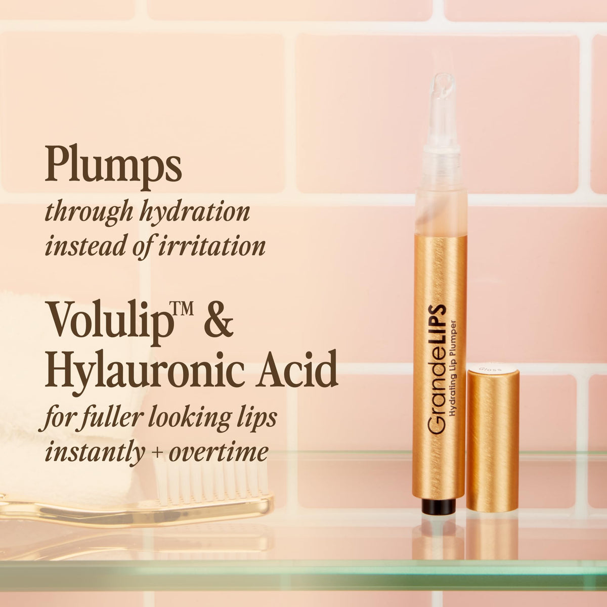 GrandeLIPS Hydrating Lip Plumper Gloss on lips