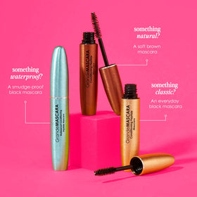 GrandeMASCARA Waterproof Peptide Mascara on a vanity with makeup tools