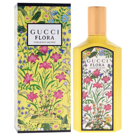 Gucci Flora Gorgeous Orchid EDP 3.3 oz bottle with floral background