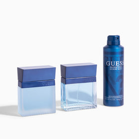 GUESS Seductive Blue Eau de Toilette on a wooden surface