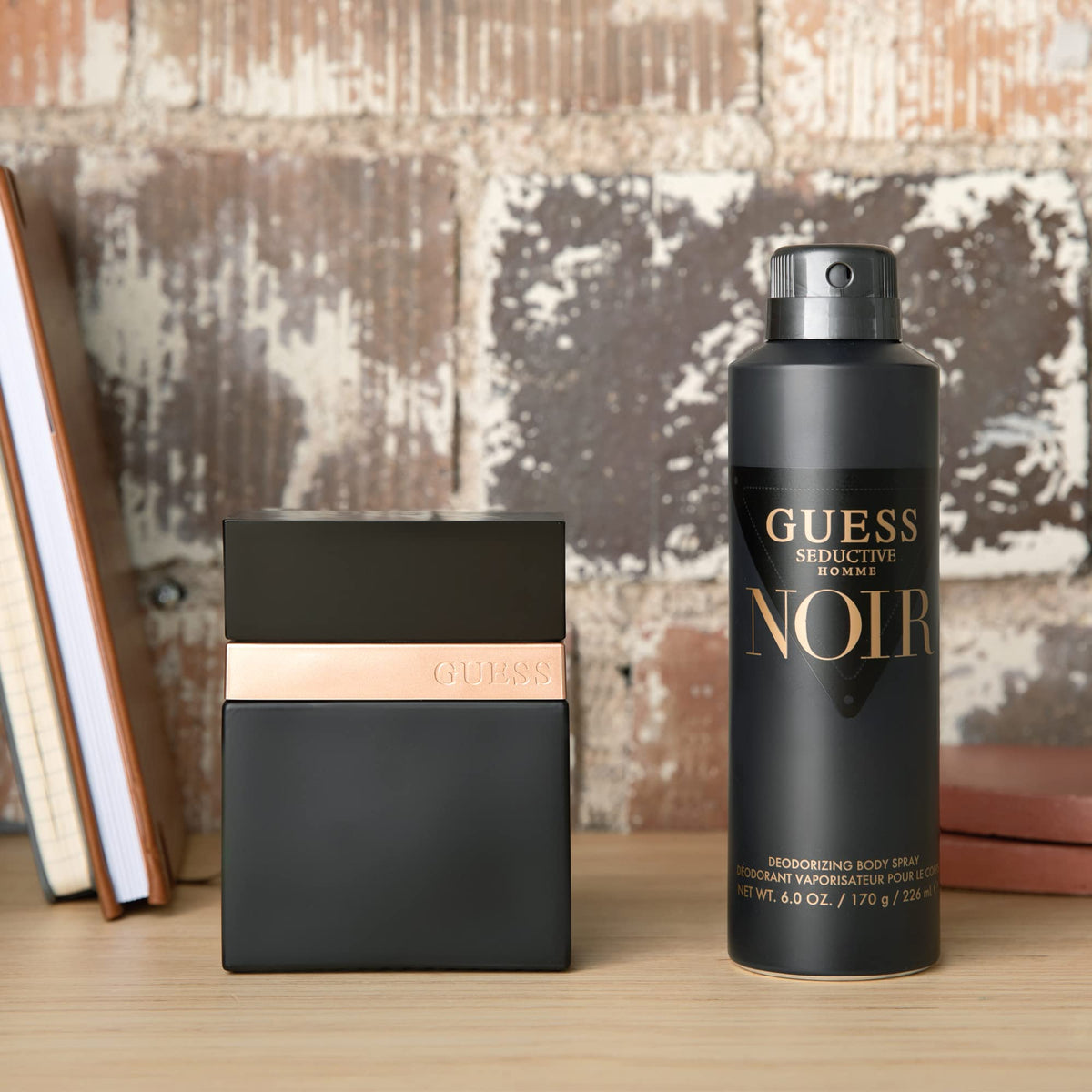 GUESS Seductive Noir Eau de Toilette on a wooden surface