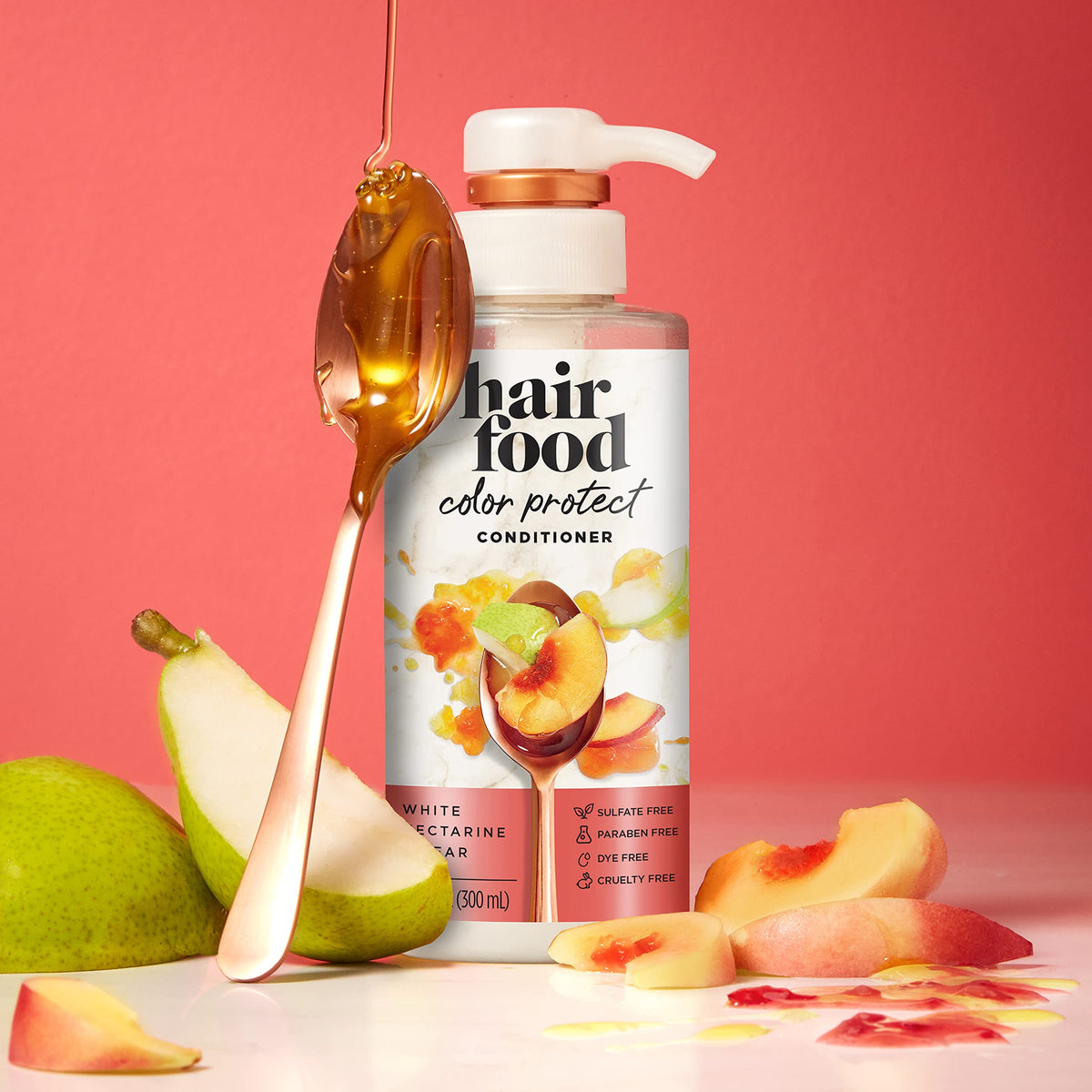 Hair Food Nectarine & Pear Color Protect Conditioner on a bathroom shelf