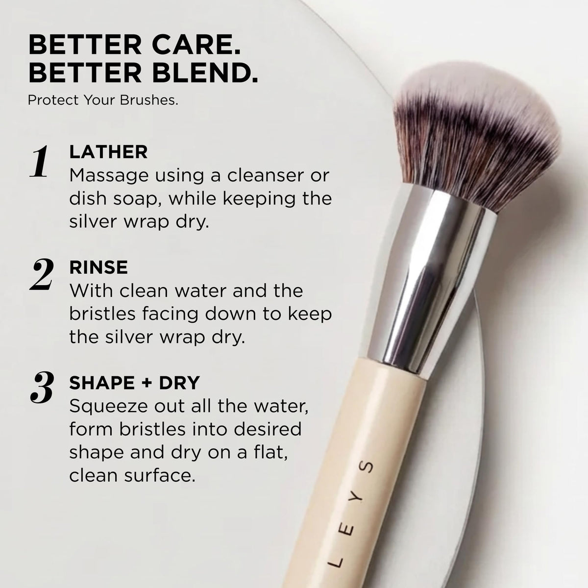 HALEYS Kabuki Brush with powder foundation on a vanity