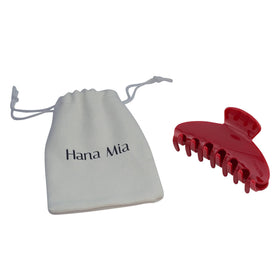 Hana Mia Large Red Claw Clip in use outdoors