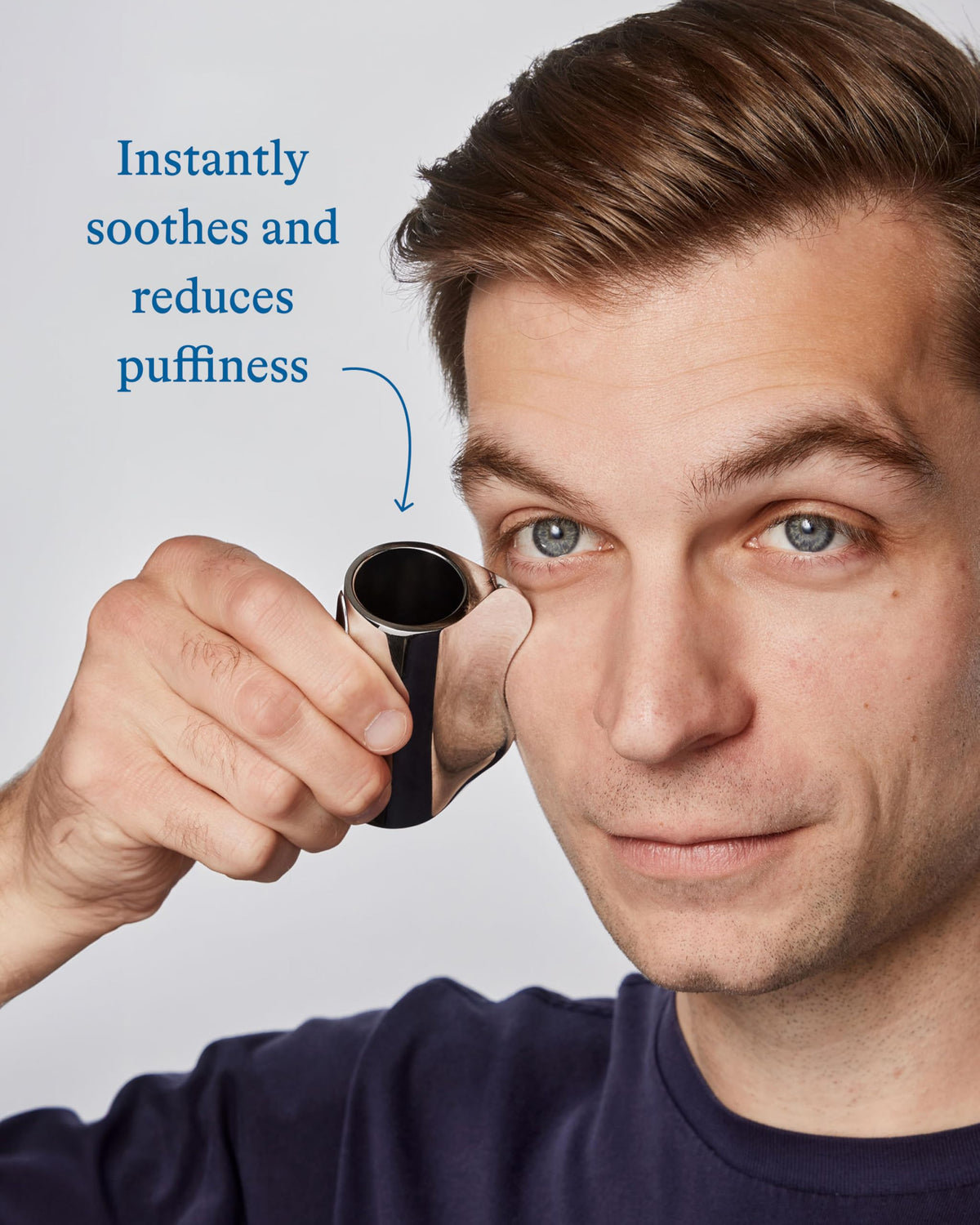 Harry's Cooling Eye Stick being applied under the eye