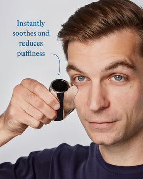 Harry's Cooling Eye Stick being applied under the eye