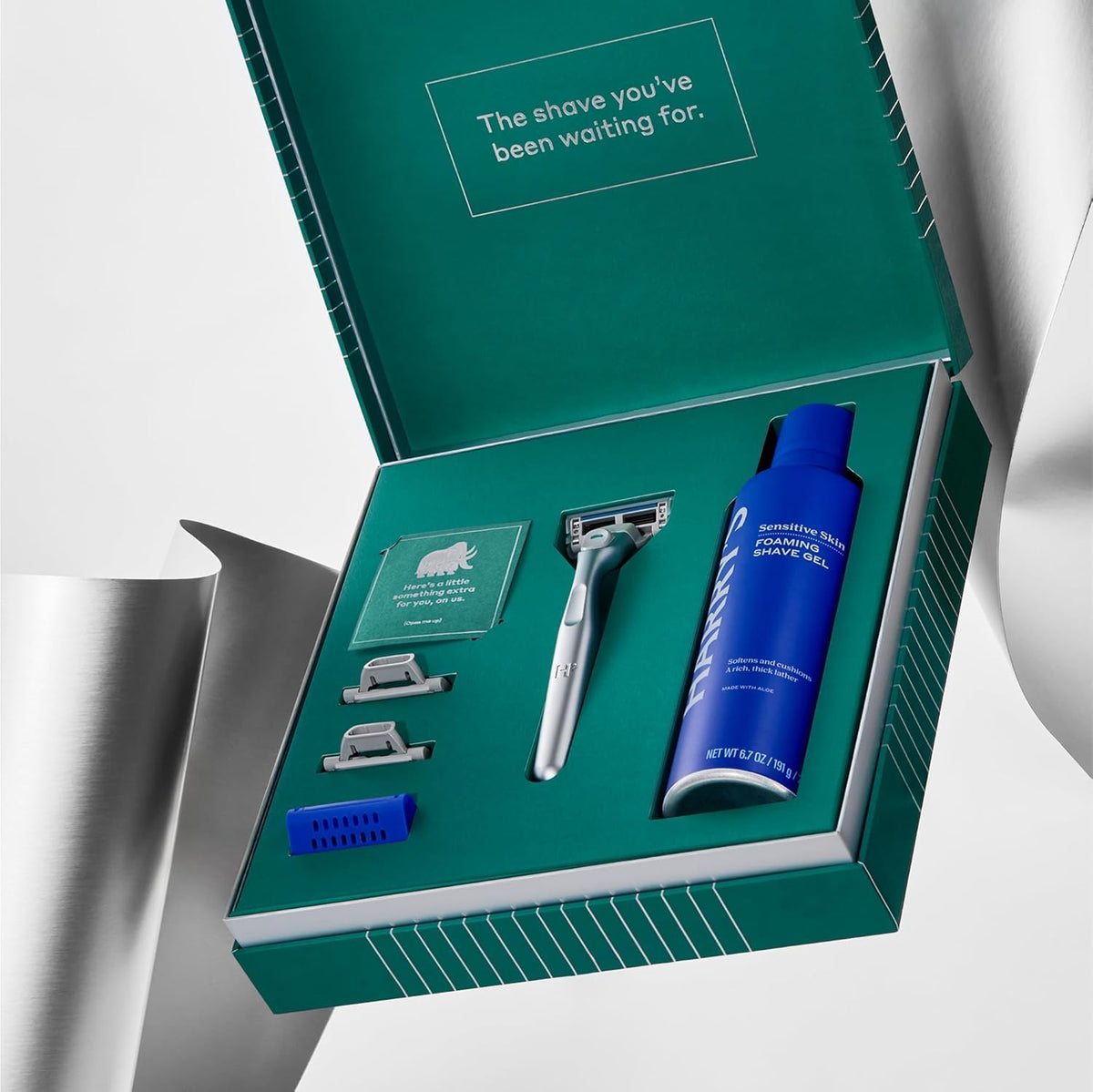 Harry's Plus razor cartridges with five blades and lubricating strip