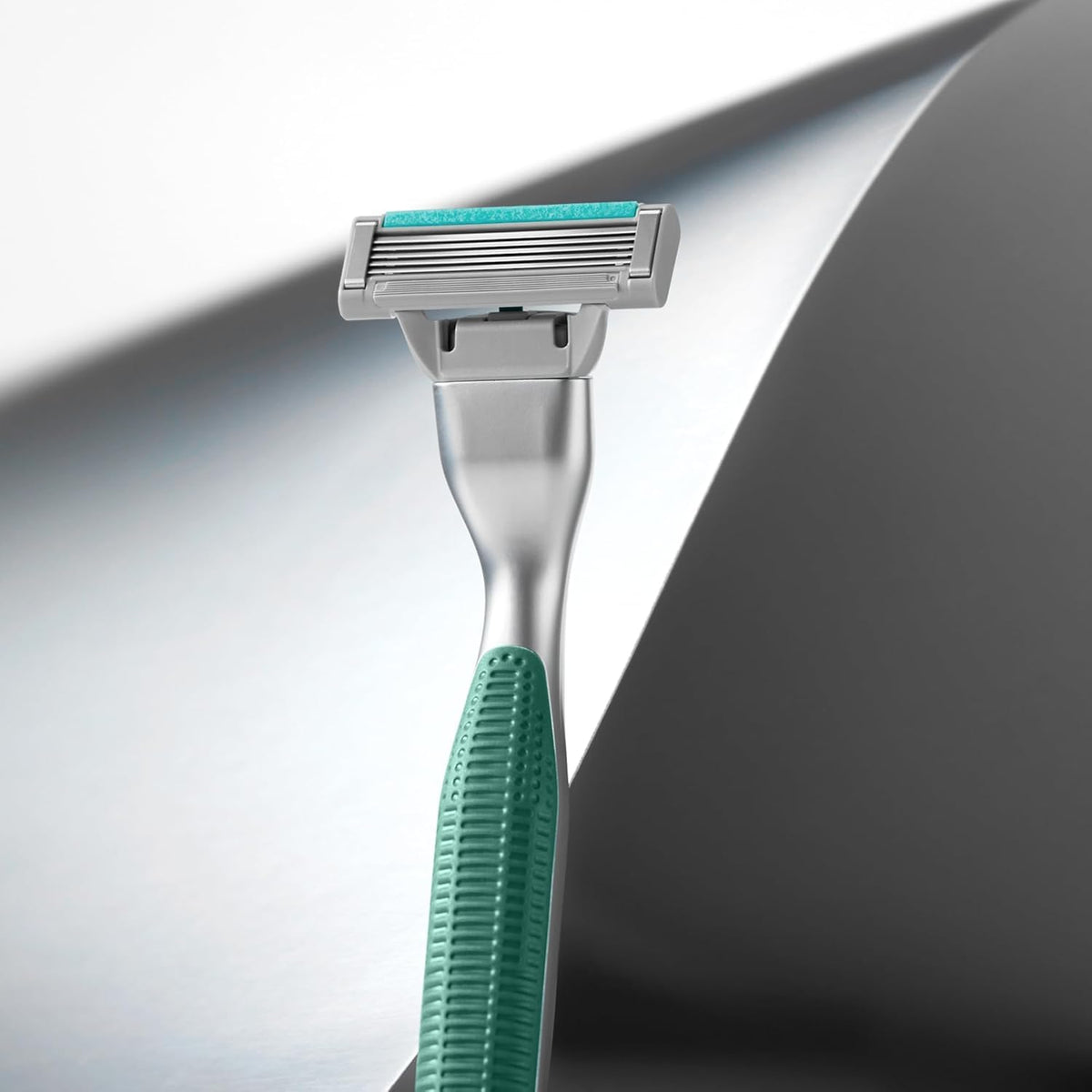 Harry's Plus razor in use during a shave