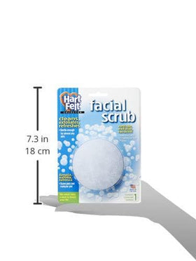 HartFelt Round Face Scrubber with soap and lotion on a bathroom counter