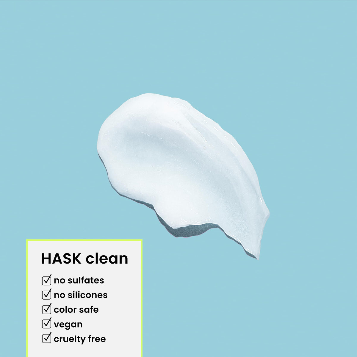 HASK Repair + Argan Oil Shampoo pouring into hand