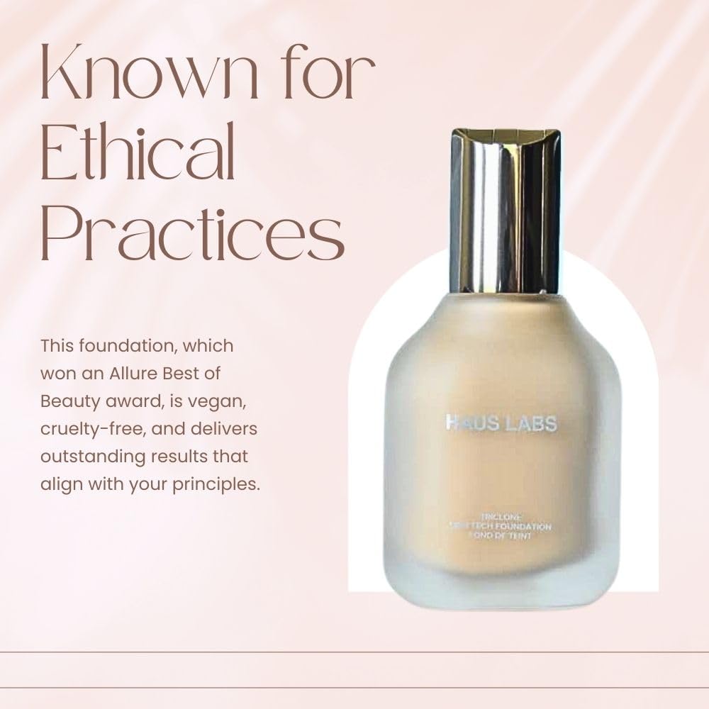 Haus Laboratories Triclone Skin Tech Foundation on a makeup table with brushes