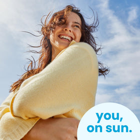 Hawaiian Tropic sunscreen lotion in outdoor setting