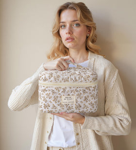 HBselect Quilted Makeup Bag Set in a suitcase for travel