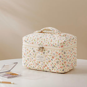 HBselect Quilted Makeup Bag Set lifestyle scene with cosmetics inside