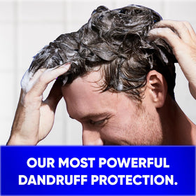 Head & Shoulders Clinical Strength Anti-Dandruff Shampoo on a bathroom shelf