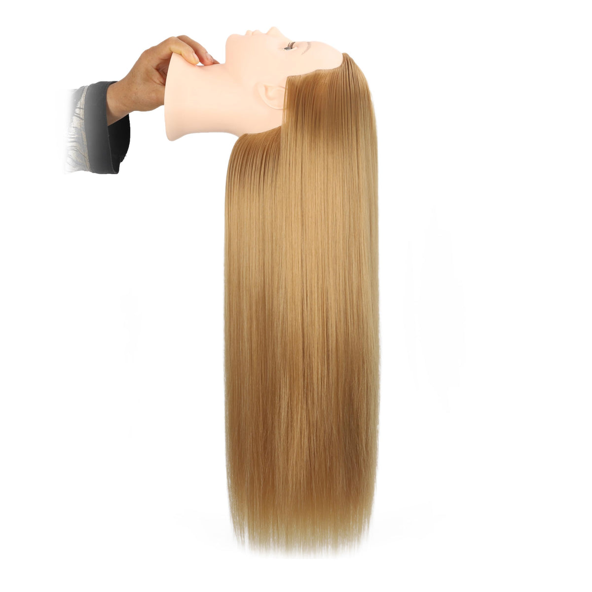 Headdoll mannequin head in a salon setting with accessories