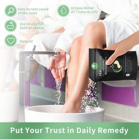 HEAMAVIN Tea Tree Oil Foot Soak in a foot basin