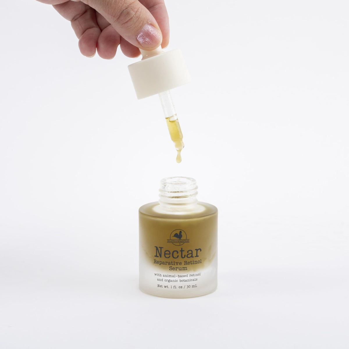 Hearth and Homestead Nectar Serum application on skin
