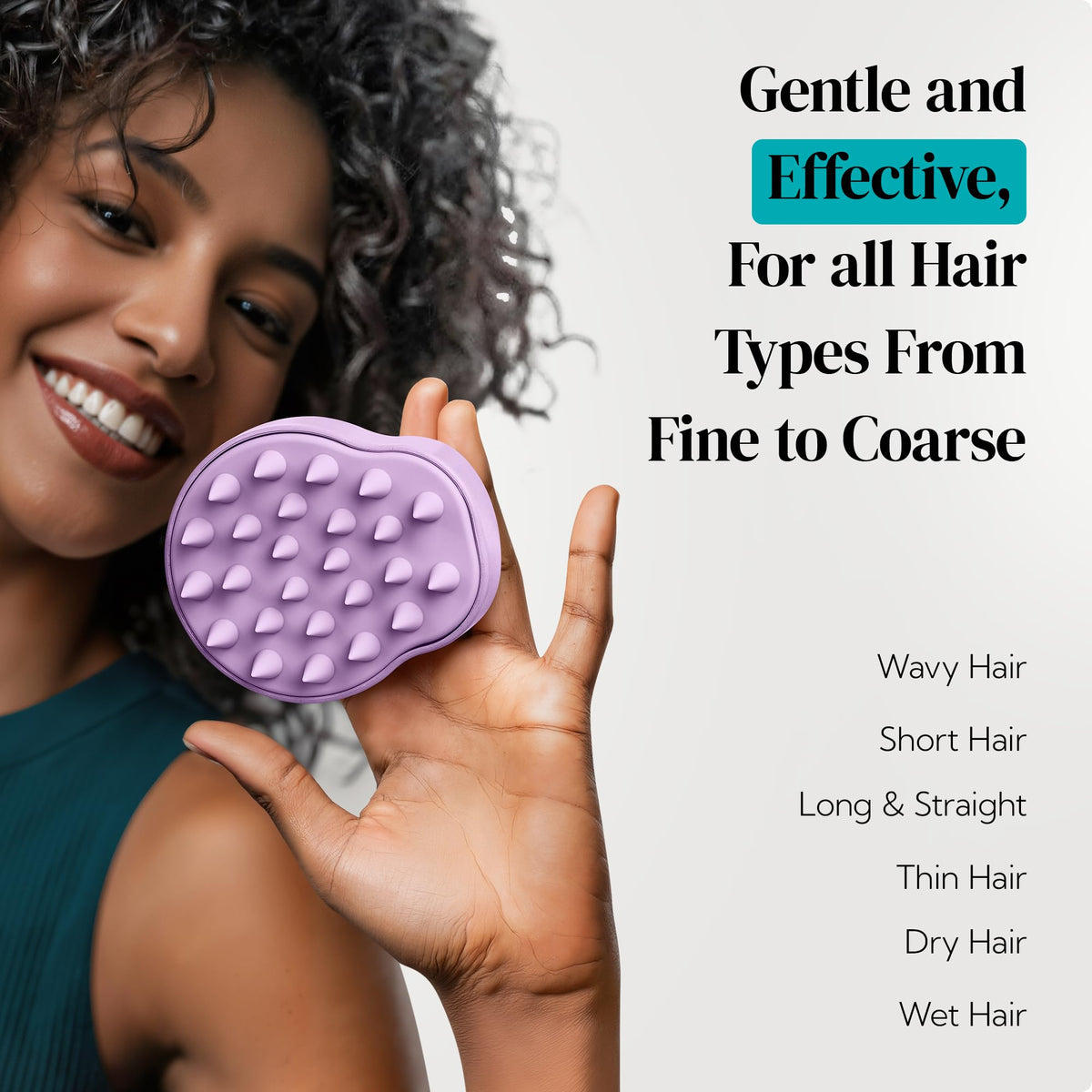 HEETA scalp massager shampoo brush in a hand demonstrating grip