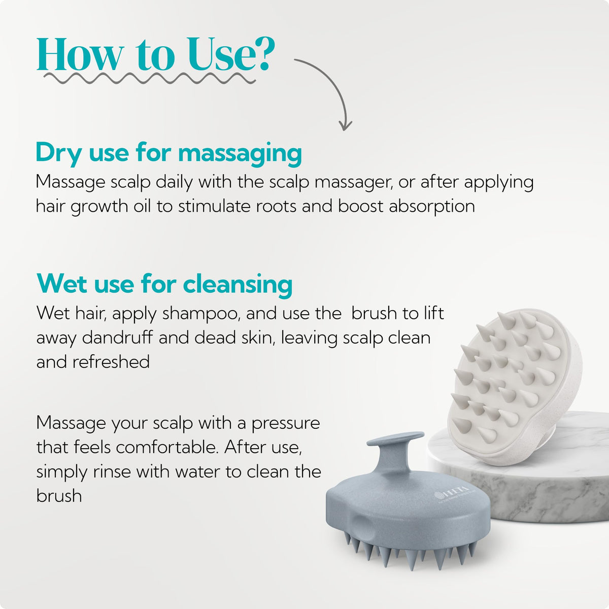 HEETA scalp massager shampoo brush in hand demonstrating grip