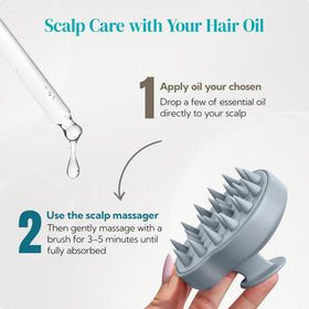 HEETA scalp massager shampoo brush on a bathroom counter