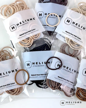 Heliums Small Hair Ties arranged neatly in a bowl
