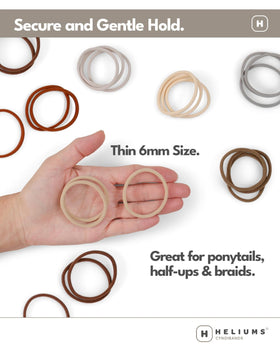 Heliums Thin Hair Ties 6mm Beige Blonde on a table