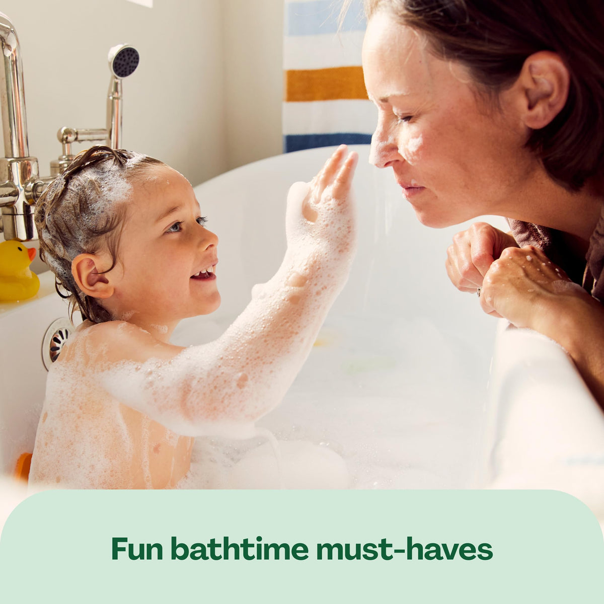 Hello Bello Baby Shampoo & Body Wash in a bath setting with baby