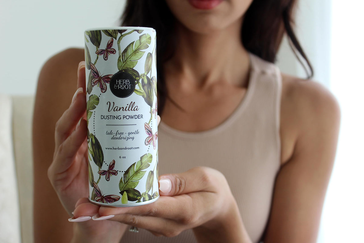 Herb & Root Vanilla Body Dusting Powder in bathroom setting