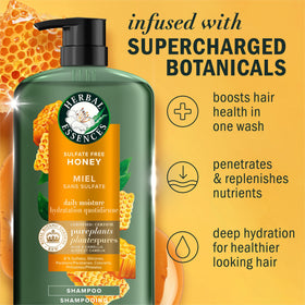 Herbal Essences Shampoo bottle side view with honey and camellia oil