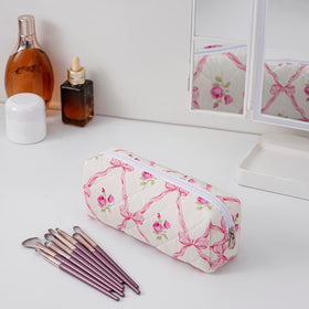 HHQQWZ Floral Cotton Makeup Brush Bag displayed with cosmetics