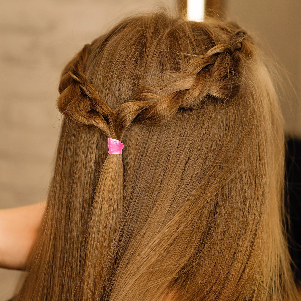 Hicarer Mini Rubber Hair Bands in a hand for portability