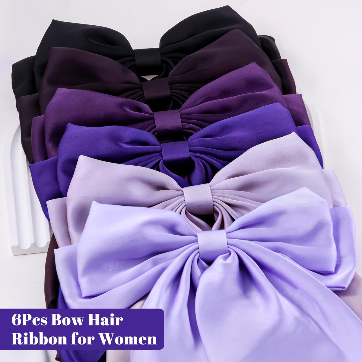 hisial Large Bow Hair Clip in a lifestyle setting on a calendar