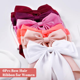 hisial large bow hair clip in black on a table
