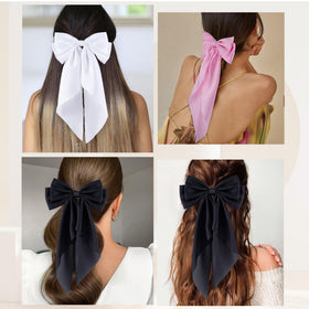 hisial Large Bow Hair Clip in white on a casual outfit