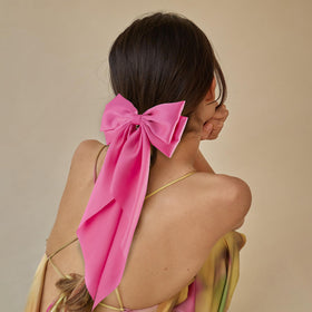 hisial large bow hair clip in wine red on a hairstyle