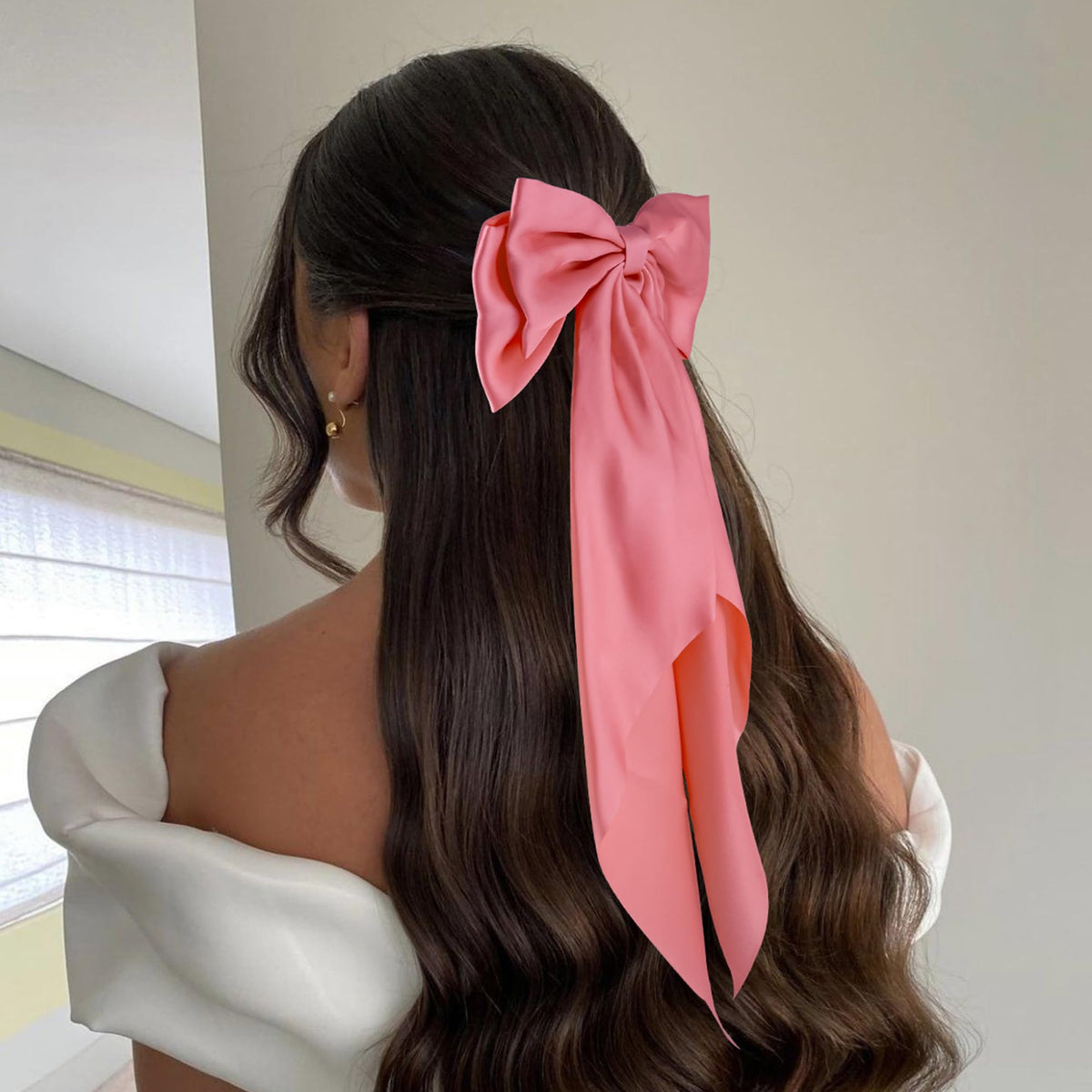 hisial Large Bow Hair Clip on a model's hair, styled elegantly