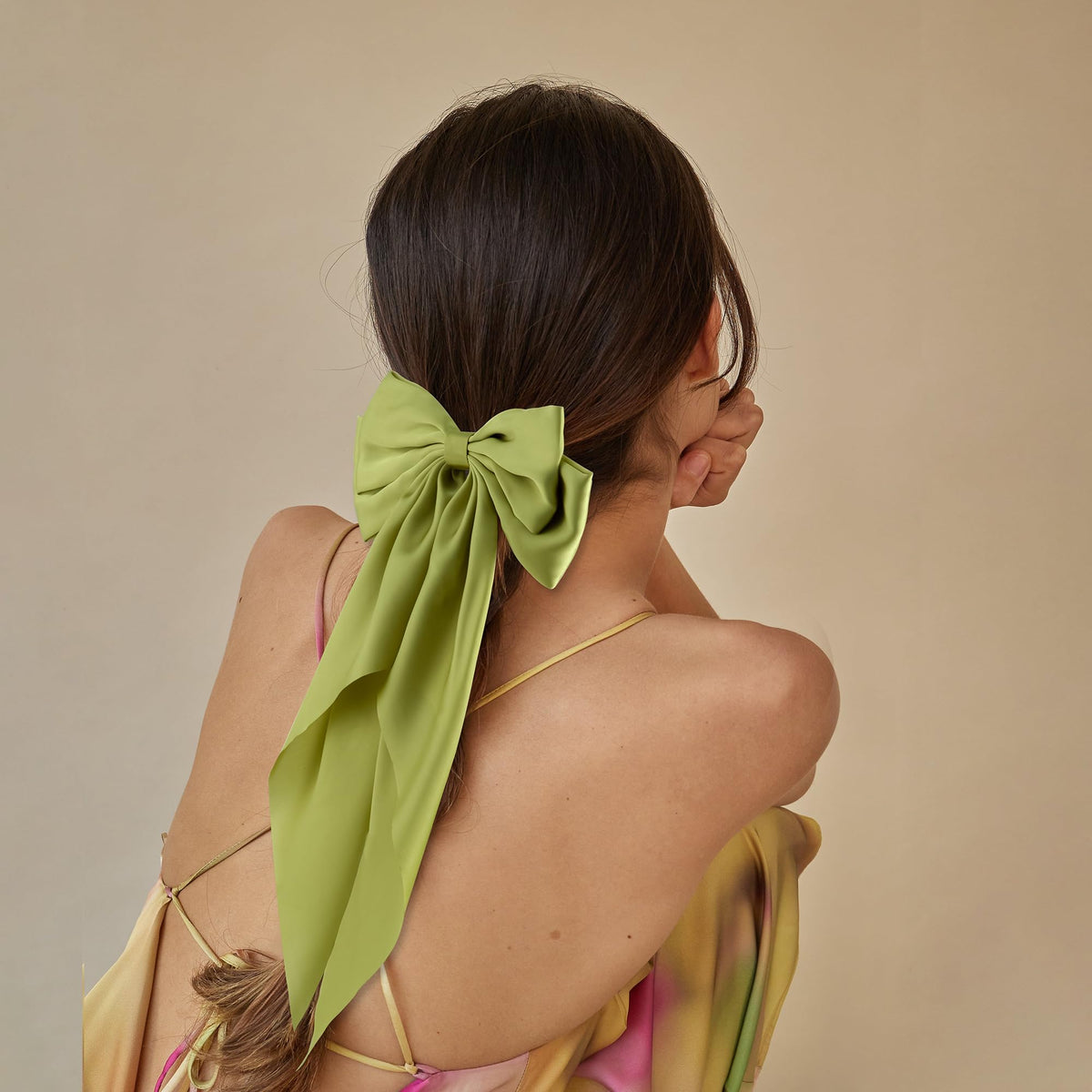 hisial large bow hair clip styled in half updo