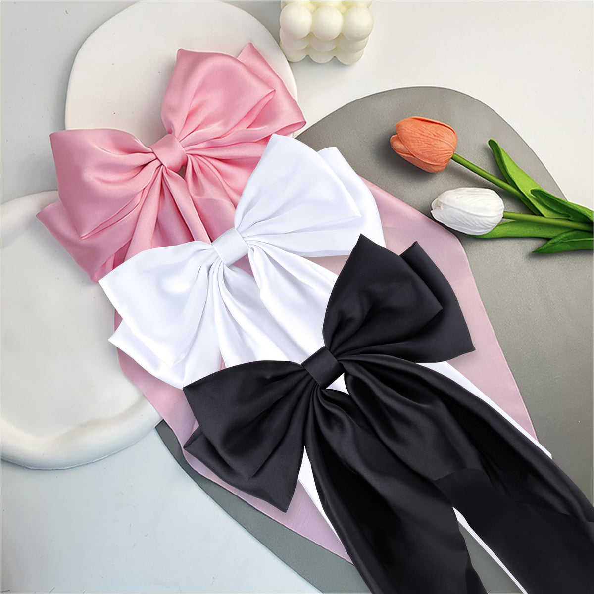 hisial Large Bow Hair Clips arranged in a decorative setting