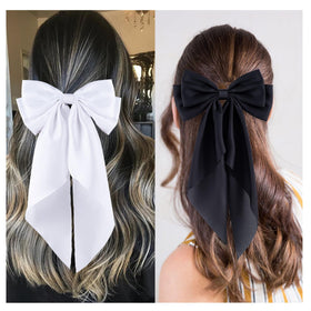 hisial Large Bow Hair Clips in white, styled in hair